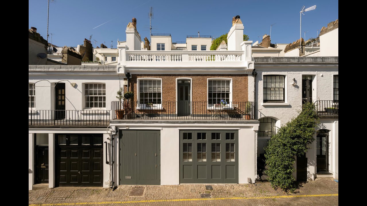 This modern two-bedroom mews house pairs crisp, contemporary design with a peaceful setting.