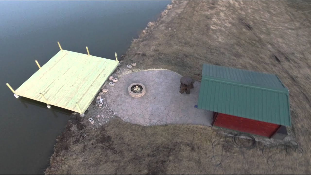 Dock with concrete piers, 20'x20' on pond