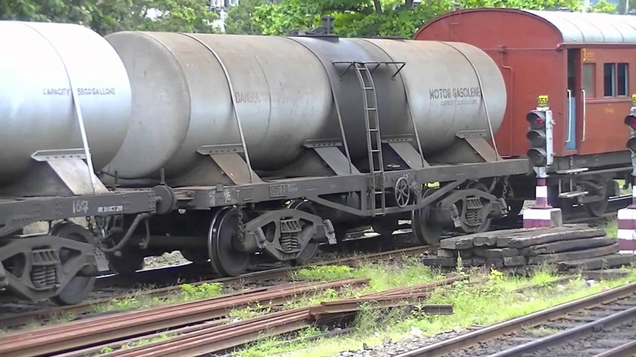 Two Hunslet shunters hauling and banking a Oil Wagon Freight Train