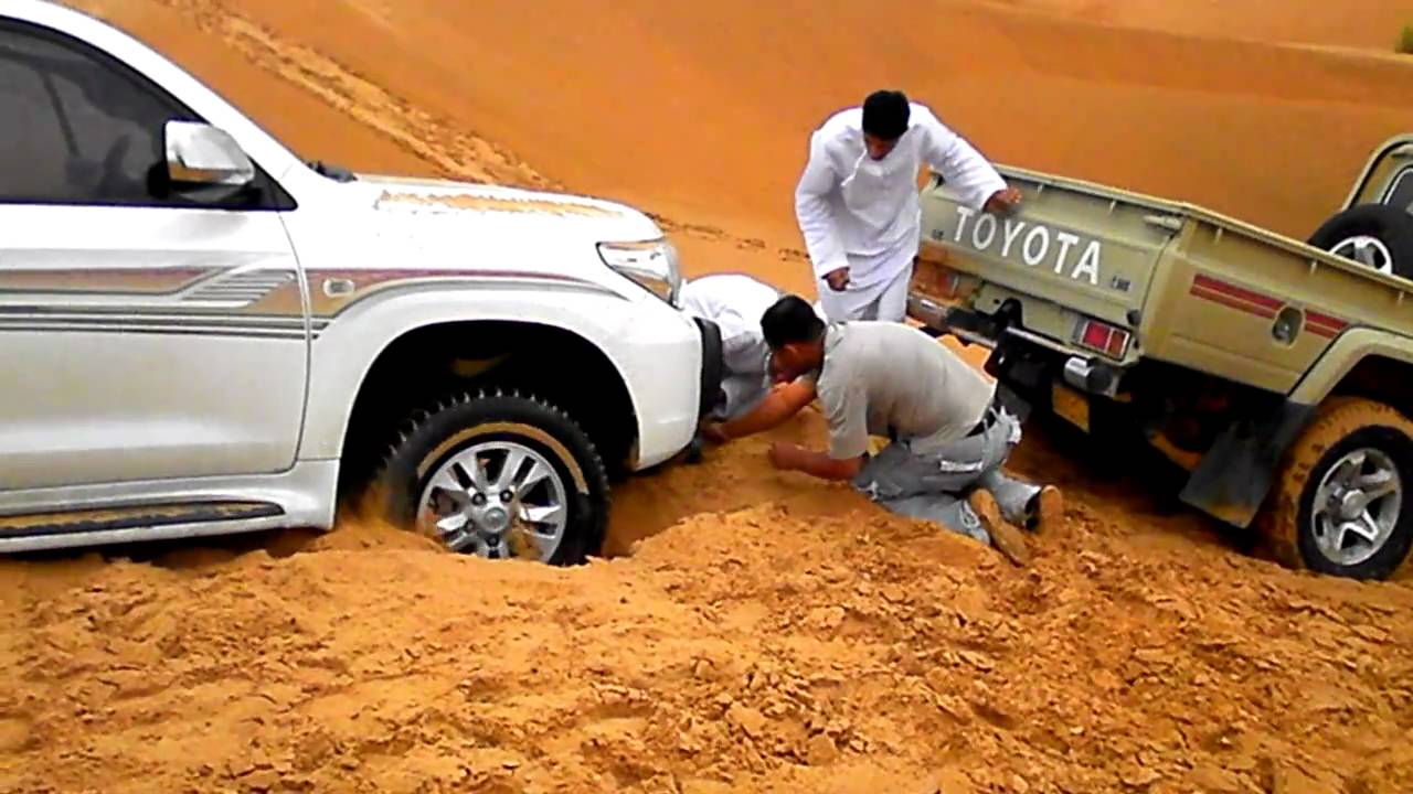 Toyota Land Cruiser stuck in desert sand