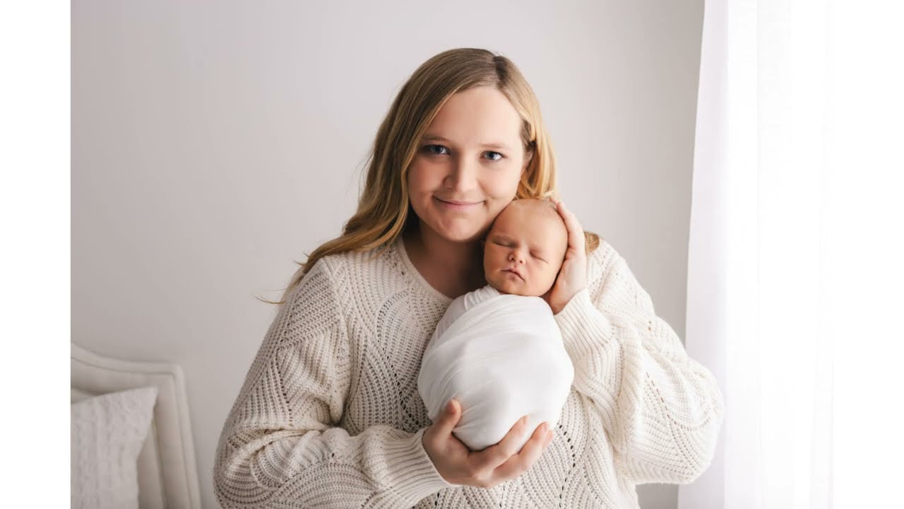 Newborn boy portraits with cowboy boots and saddle by Rebecca Danzenbaker #newbornphotographer