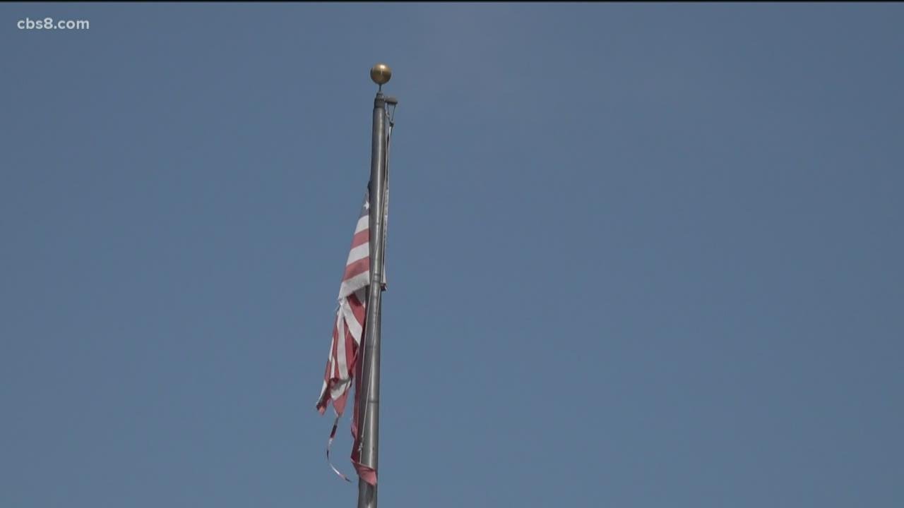 San Diegans urge the El Cortez to fix ripped and tattered American flags for Independence Day