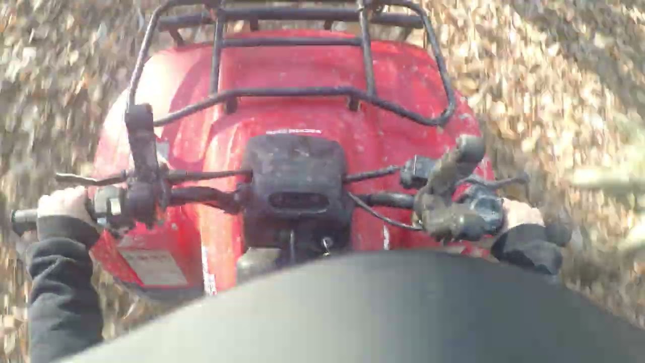 Riding Honda recon 250