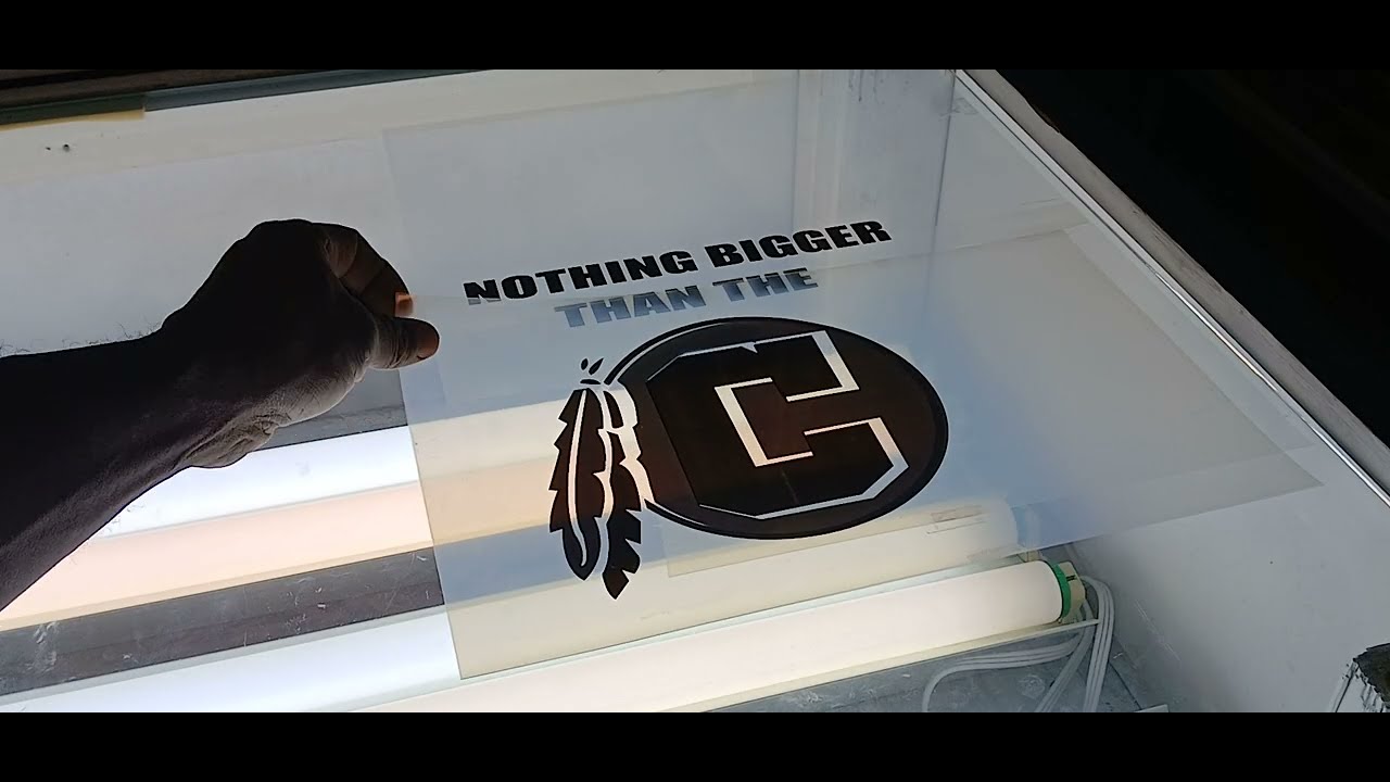 Screen Printing/ Sign Making: Setting up artwork before burning 