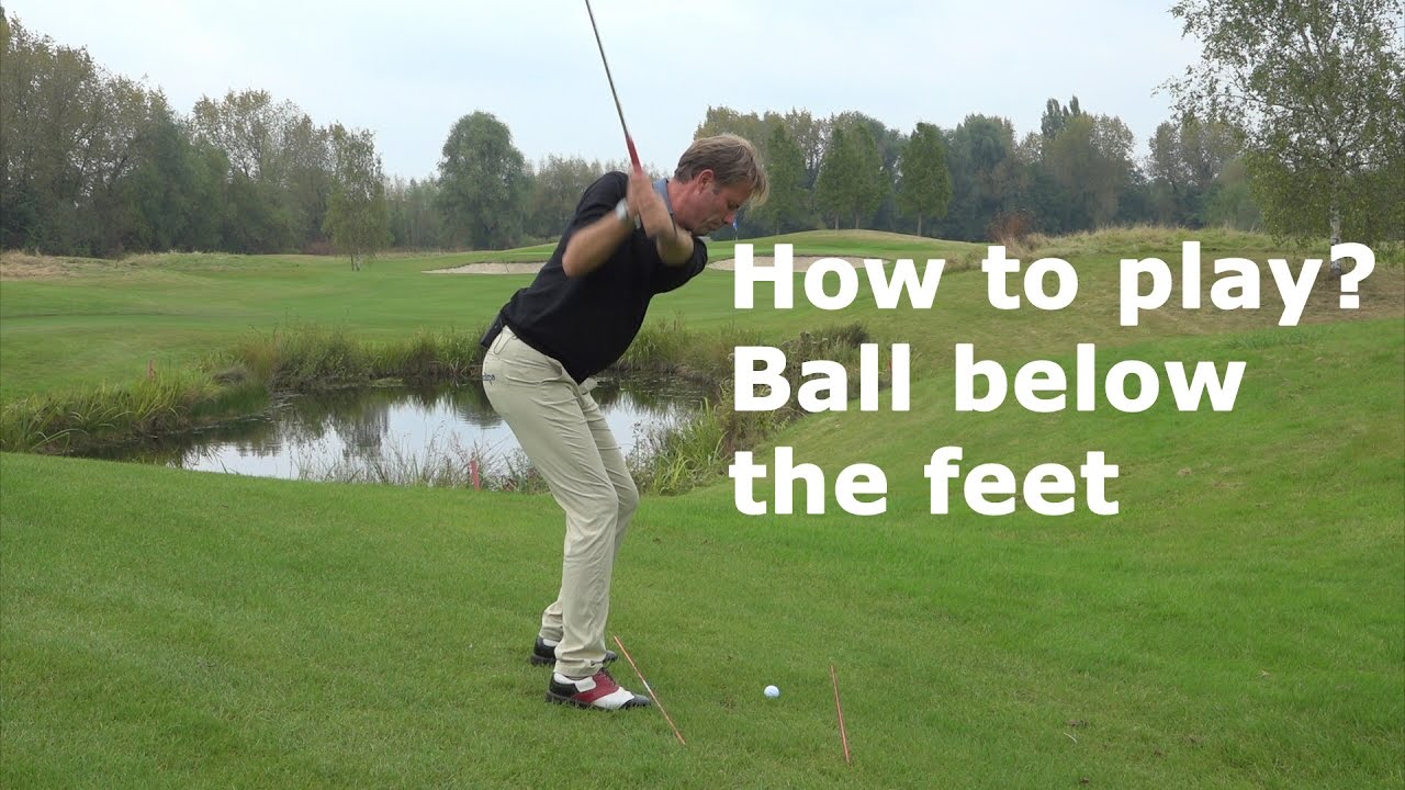 How to play a golfball below the feet?