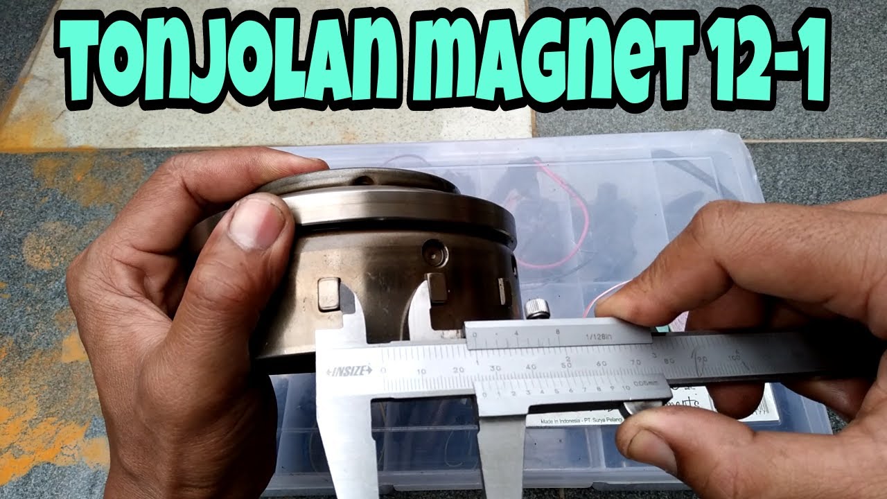 Ukur jarak tonjolan magnet motor injeksi
