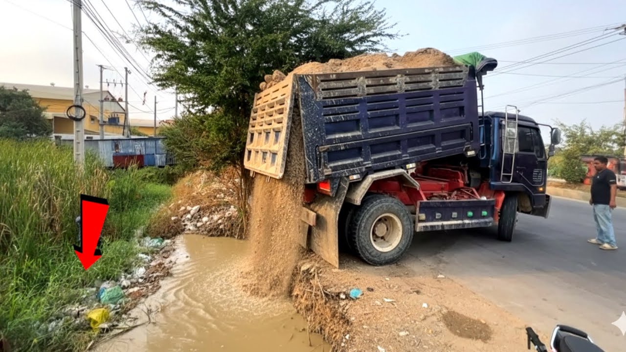 Great Start project landfill by dump truck unloading soil with expert Bulldozer working push soil 