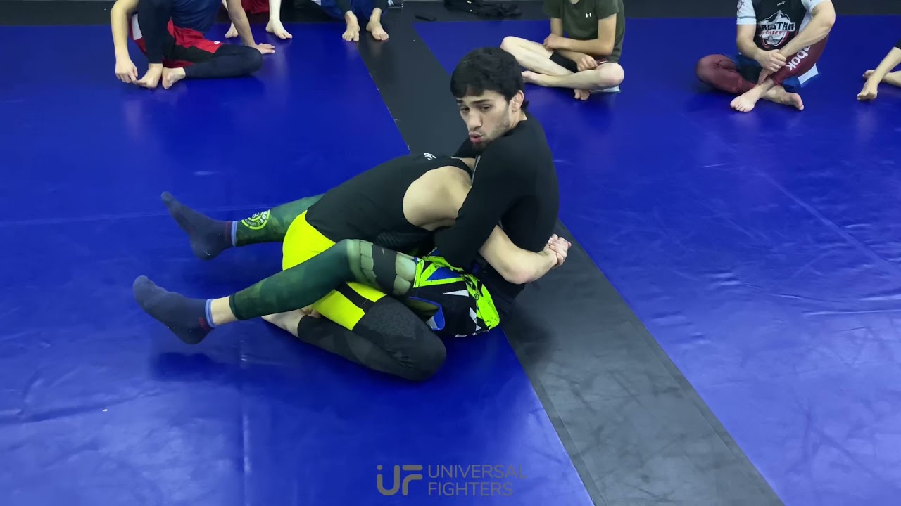 Ахмедов Заур (МСМК ПО ГРЭППЛИНУ|Black belt bjj) показывает Свип после выхода на гильотину из гарда.