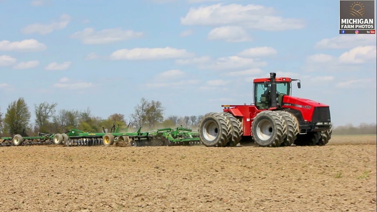 Case-IH Steiger STX375 and John Deere 637 disk spring of 2020 in Michigan.