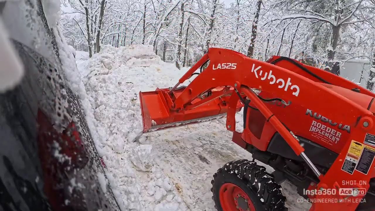 Moving first round of heavy snow with the box blade