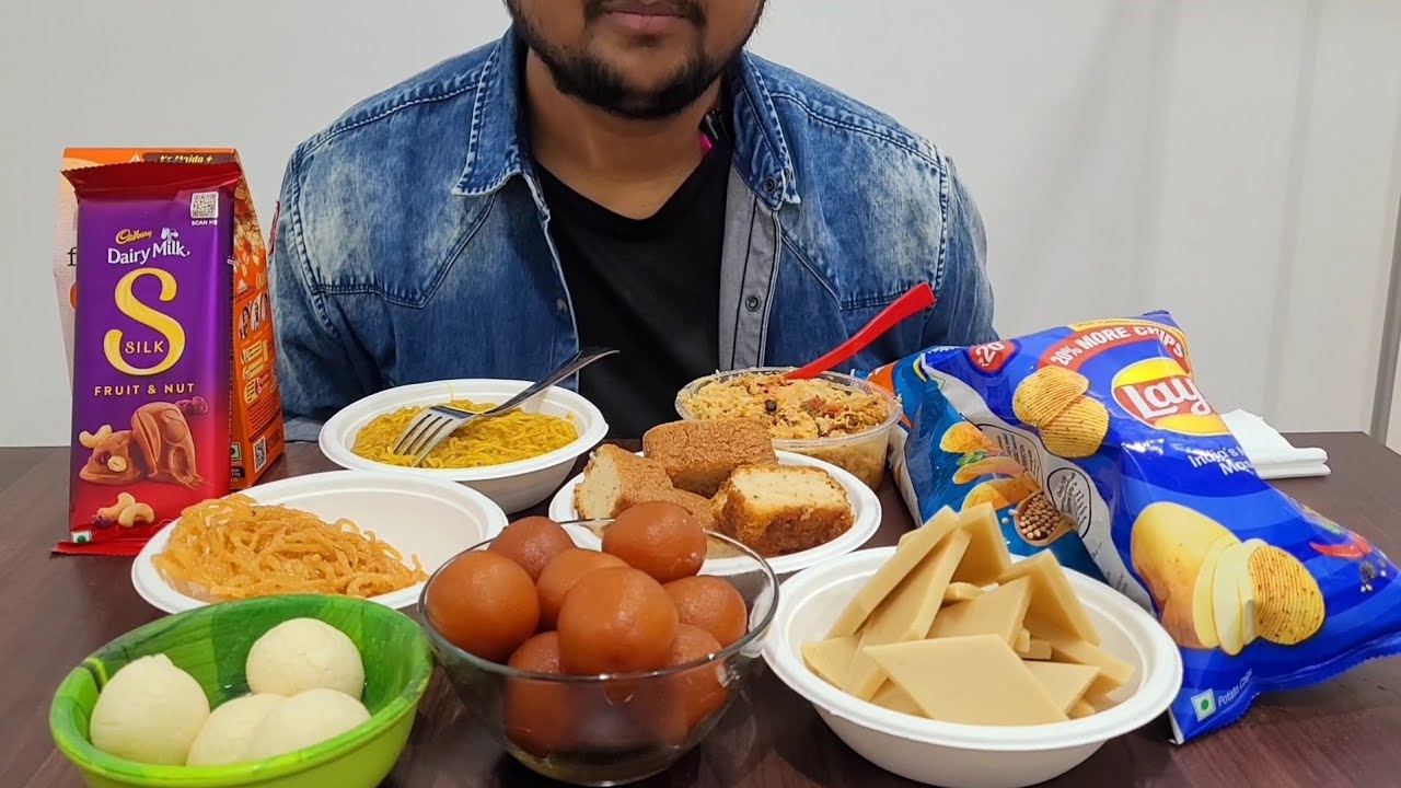 EATING CHAT+MAGGI+KURKURE+SILK FRUIT & NUT+LACHCHA JALEBI+GULAB JAMUN+SPONGY RASGULLA+KAJU BARFI