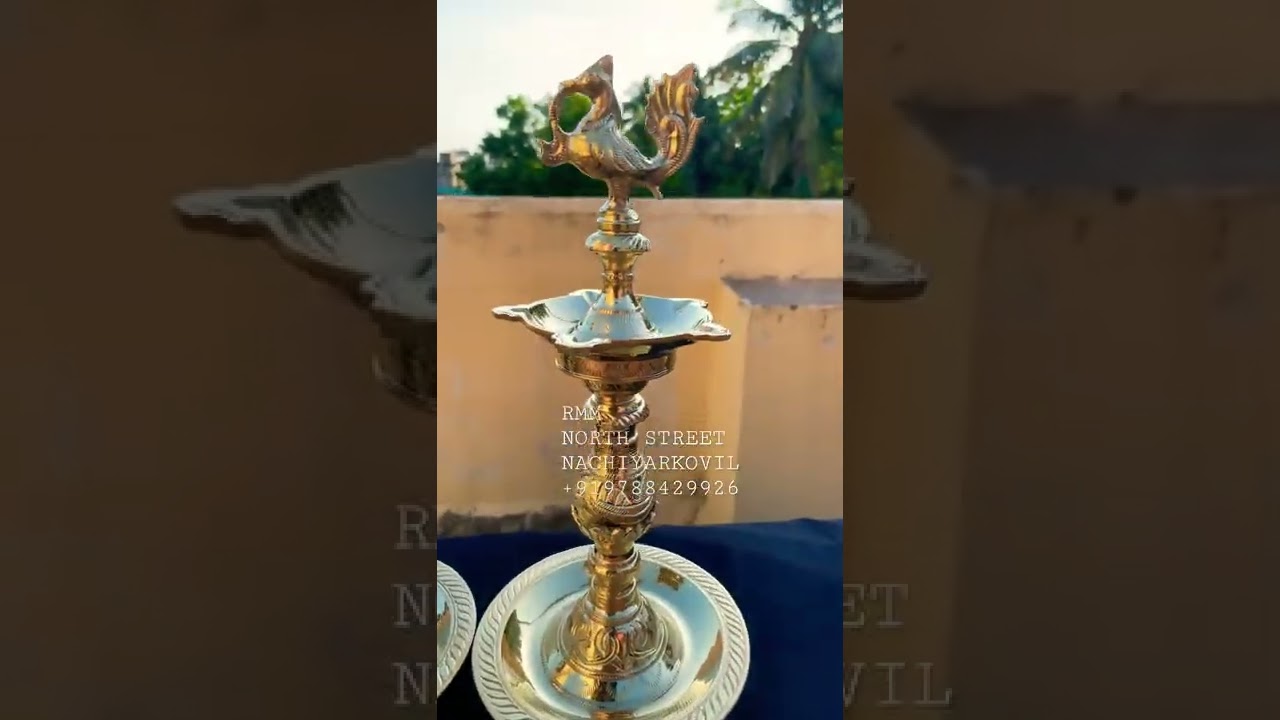 BRASS DESIGN ANNAM LAMP AT NACHIYARKOVIL