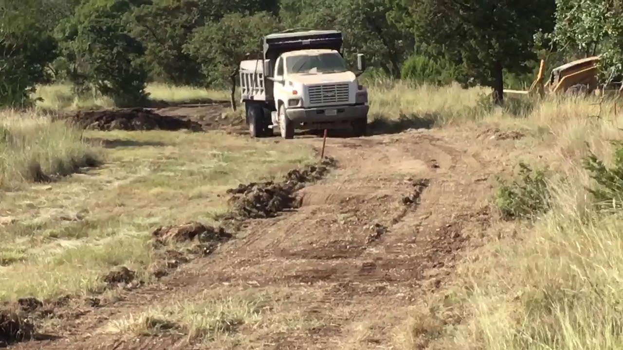 Harvesting Top Soil from road  09 23 17