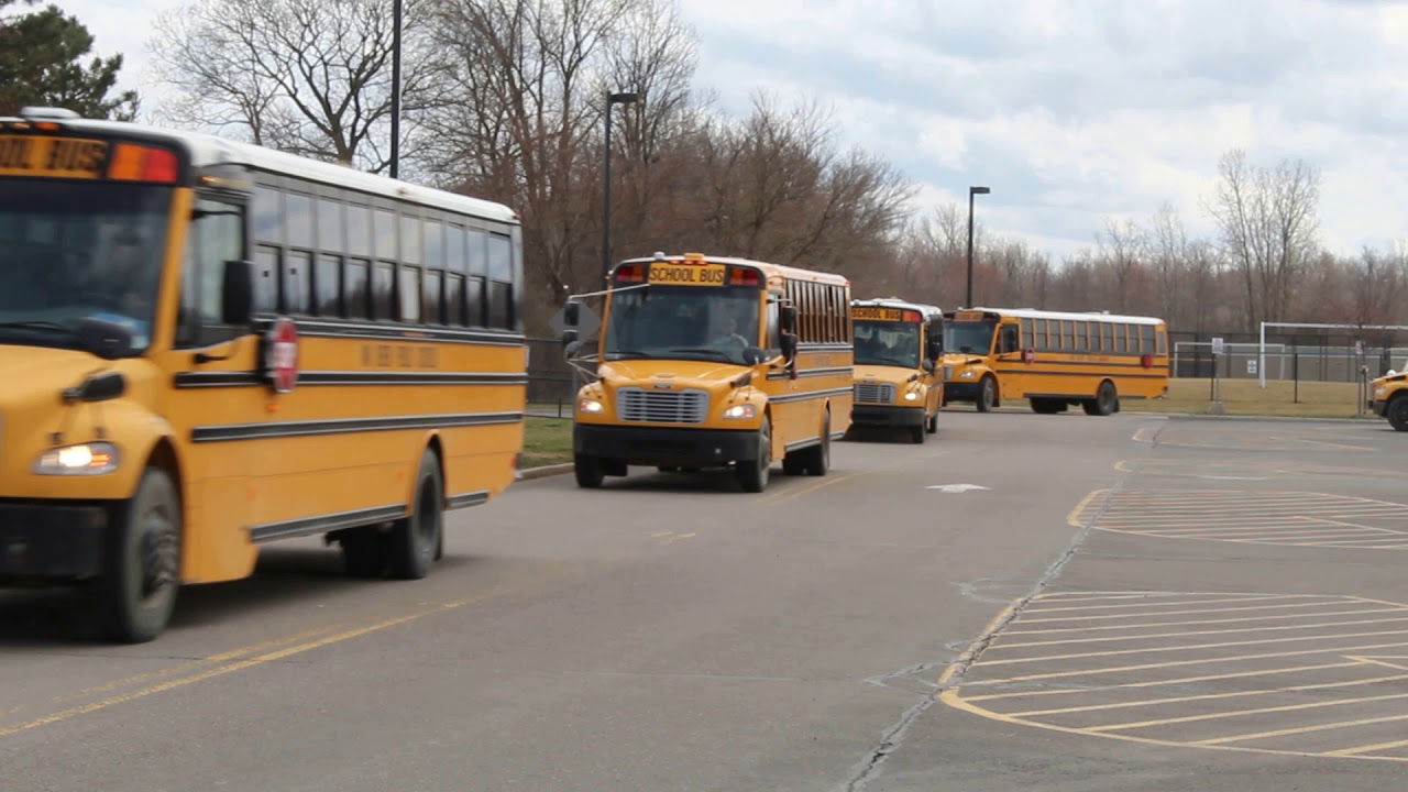 School Buses Leaving Belleville High School