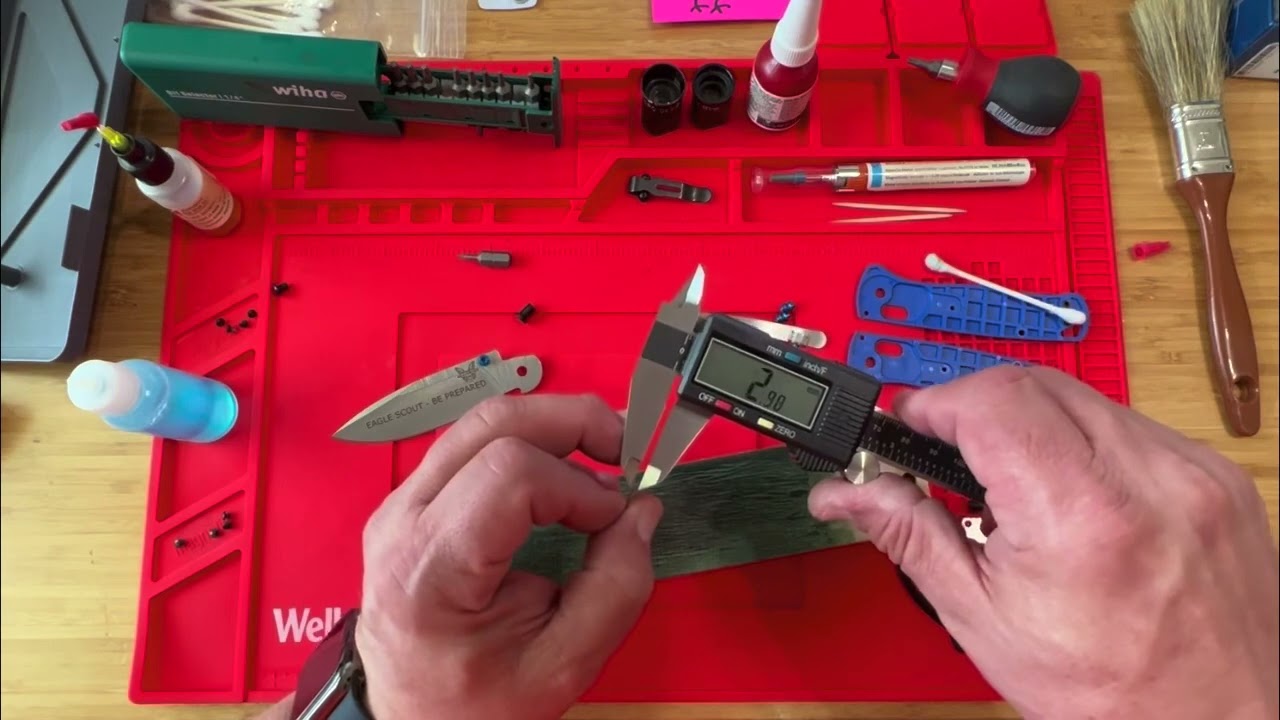 Blue G10 Benchmade Bugout… tuning an Axis lock after cleaning it and polishing the PB washers.