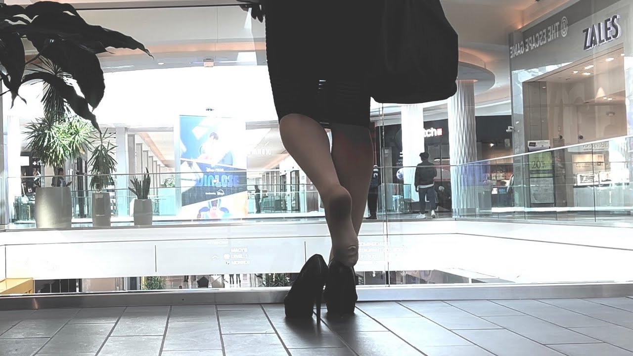 032525 Crossdresser Walks With Platform Stilettos and Tight Skirt Through the Shopping Area