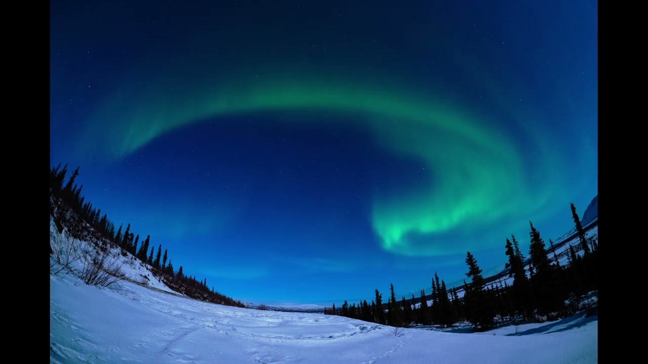Mild Aurora in Full Alaskan Moonlight.