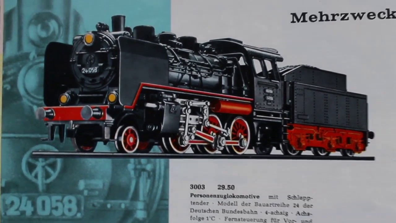 BR24  Märklin 3003 und Nostalgie-Güterwagen der 300er Serie mit Wiking-Autos auf M-Gleisen.