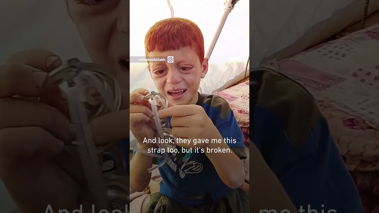 Displaced Palestinian child cries after only pair of glasses break