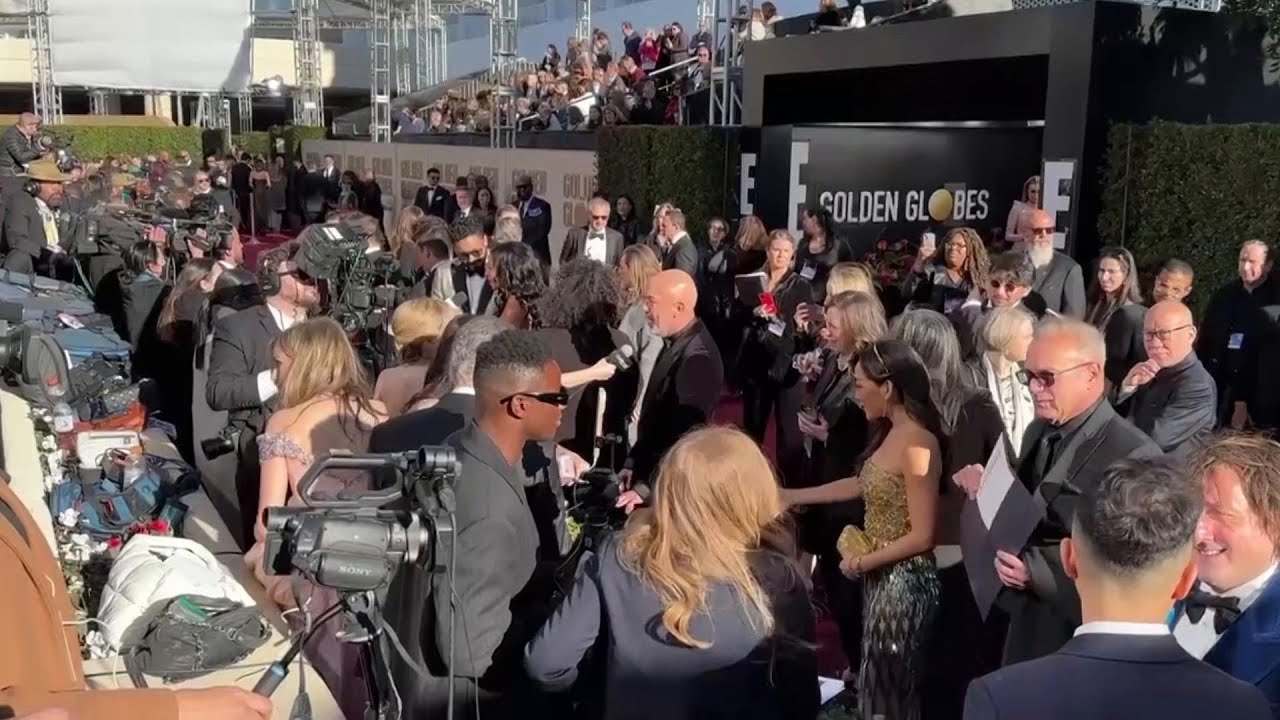 Scenes of arrivals and celeb greetings at the Golden Globes red carpet