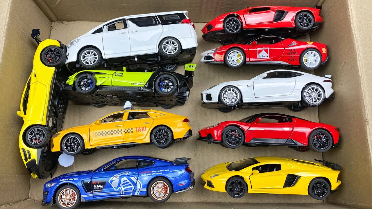 Box Full of Model Cars -Mazda Mx5, Koenigesgg Jesko, Lamborghini Scv12, Byd Yang Wang U8, Toyota Car