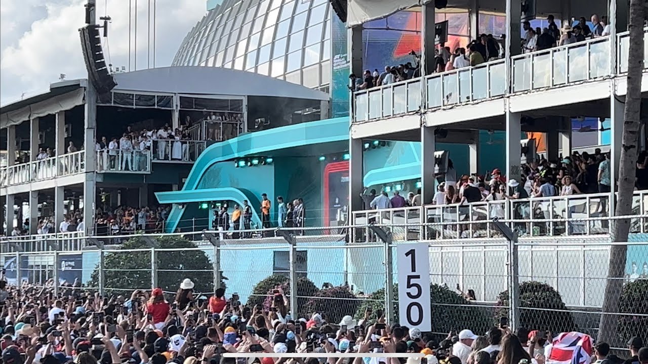 Lando Norris winning podium