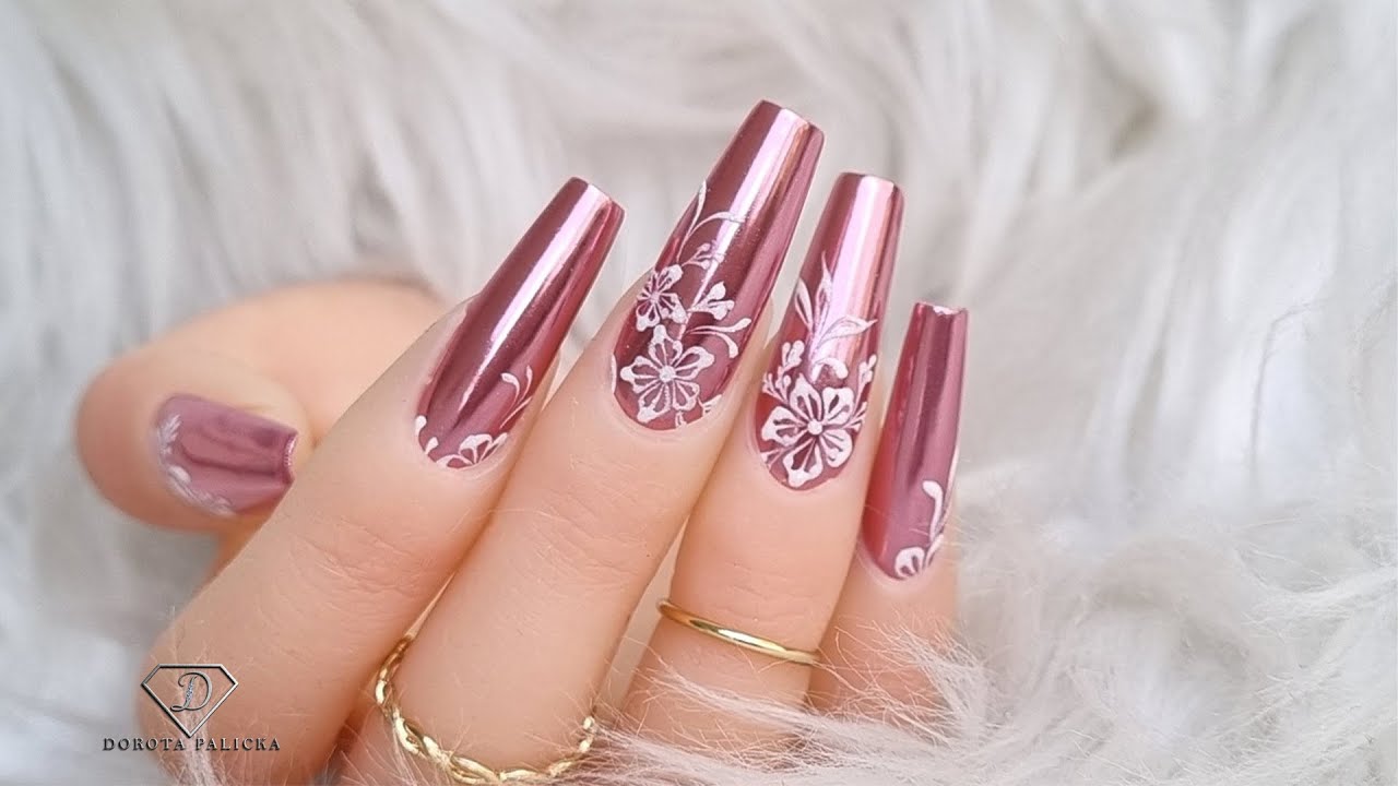 Pink Mirror Chrome Nails with easy white flowers.