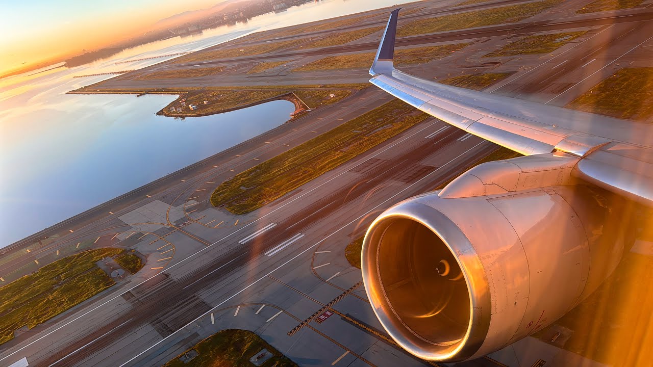 United Airlines B757-200 stunning sunrise takeoff from runway 1L San Francisco