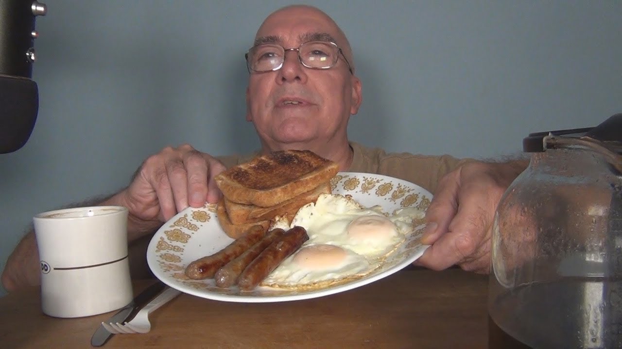 Eating Eggs, Toast,  Sausage and Heinz 57 Breakfast