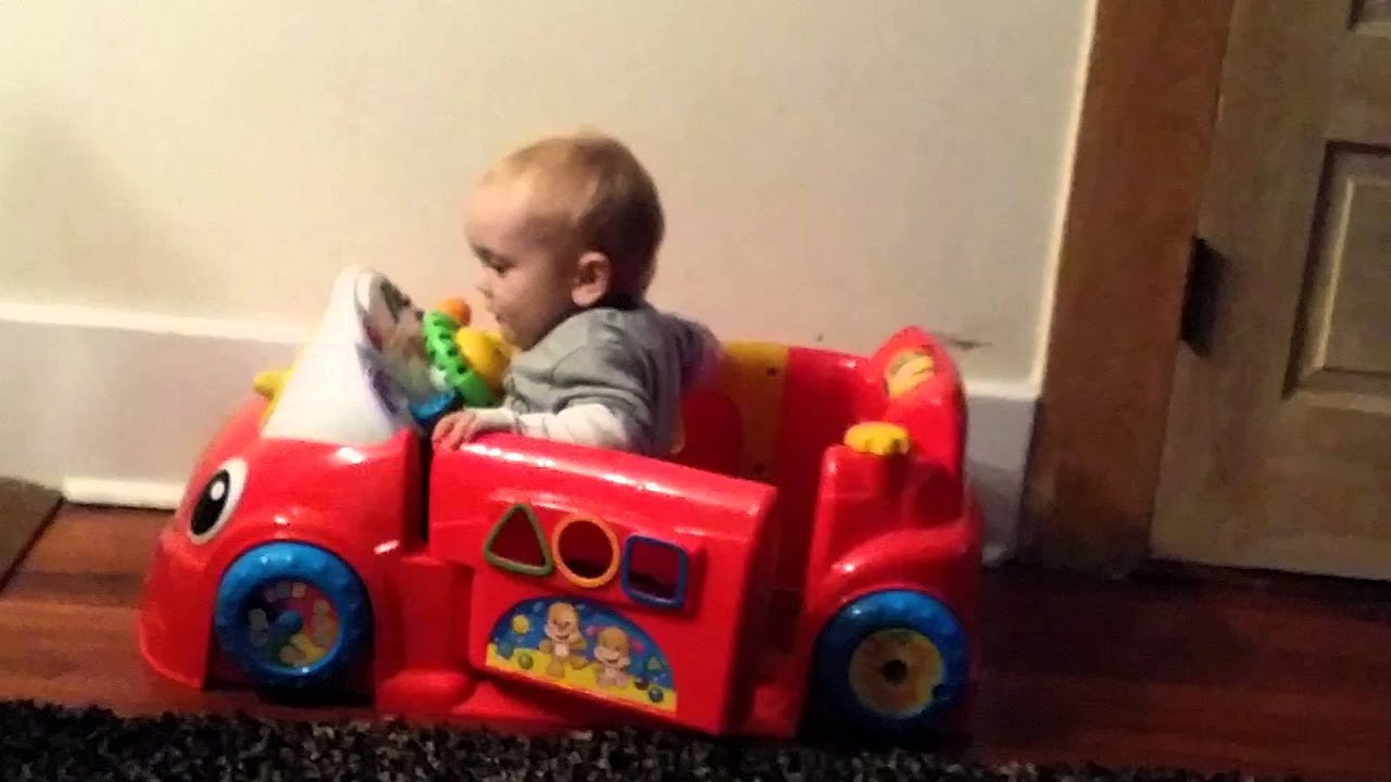 Cooper playing in Fisher Price Laugh & Learn Crawl Around Car