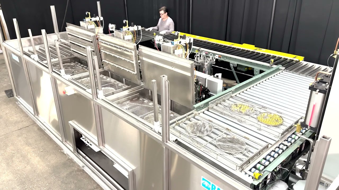 Automated Turbo, Immersion Agitation and Ultrasonic Auto-Indexing Return to Operator Cleaning System