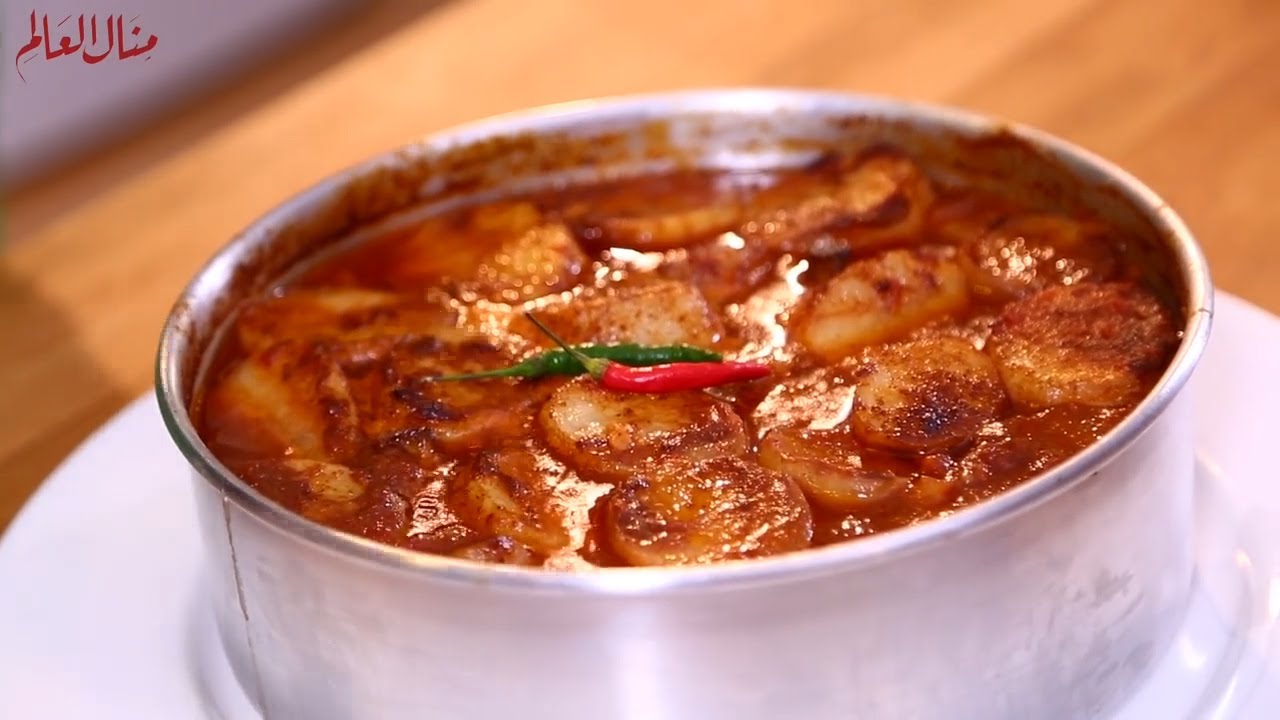 صينية البطاطس بالدجاج فى الفرن بسر التتبيلة المظبوطة بألذ طعم