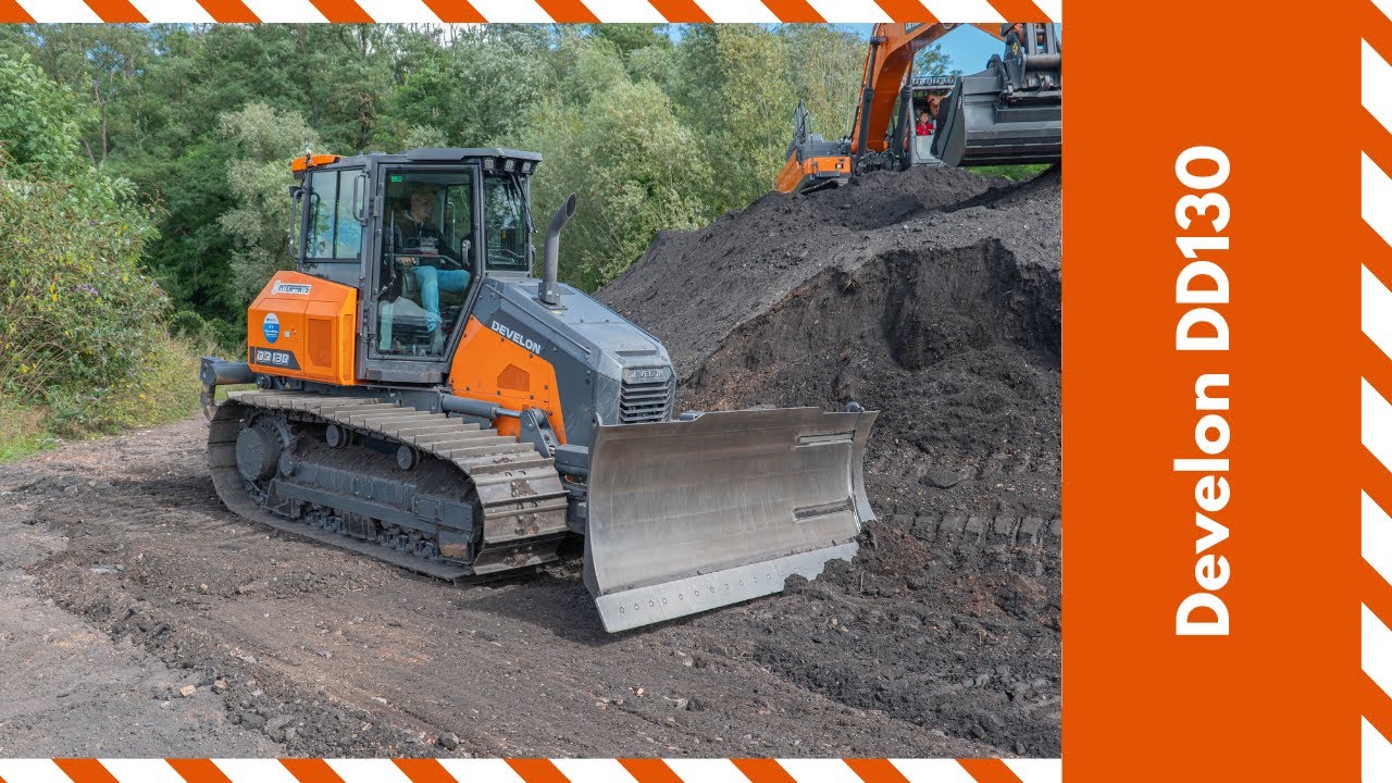 Brand new Develon DD130 bulldozer cutting a slope - Midweek Moments