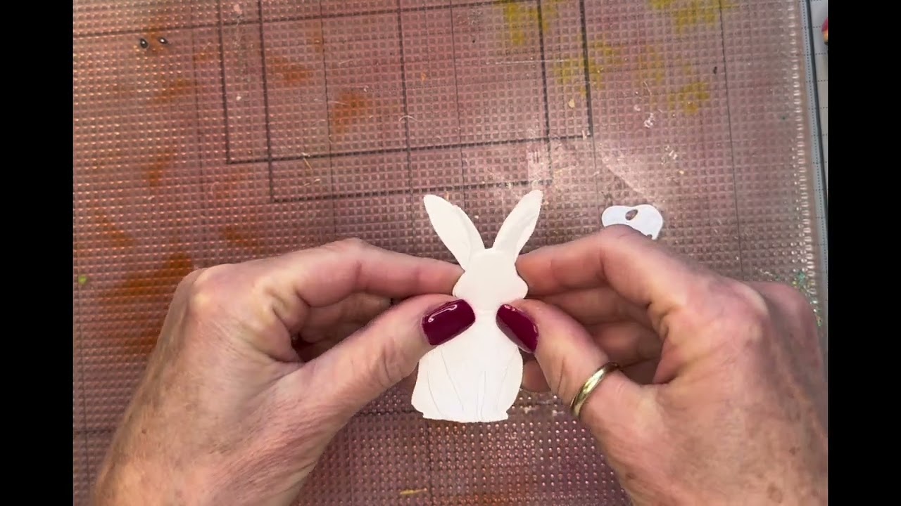 Create a darling bunny in a flower garden