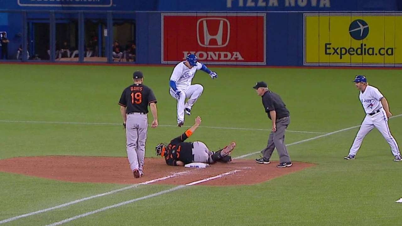 BAL@TOR: Tulo jumps at first to avoid Wieters' tag