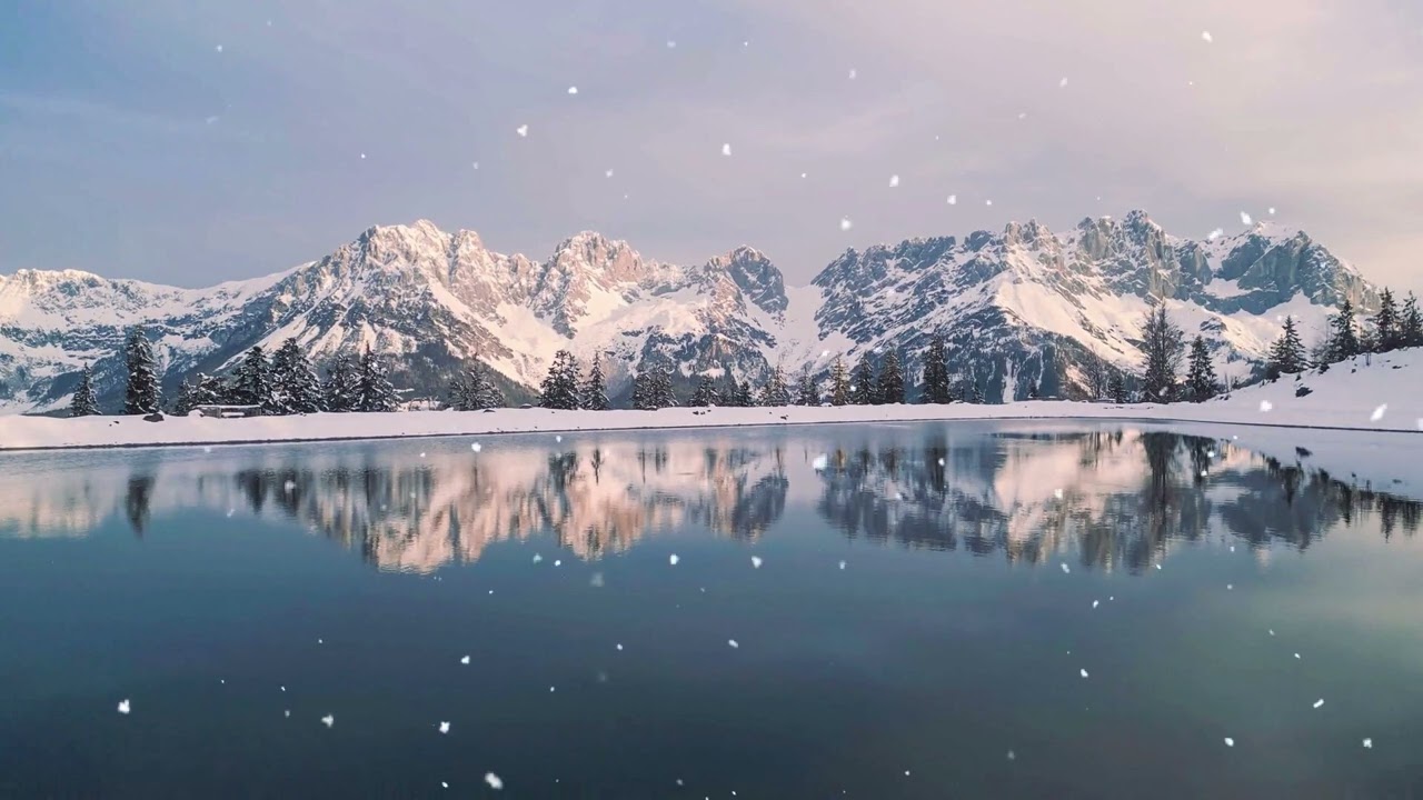 Relaxing soundscape of rain and a peaceful landscape of snow, snow  covered mountains and a lake
