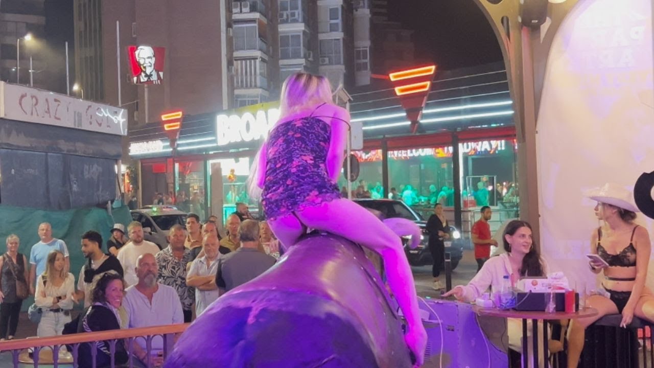 OMG 😲 TOP 5 Girls in outfits riding a mechanical bull in Benidorm 4K October 