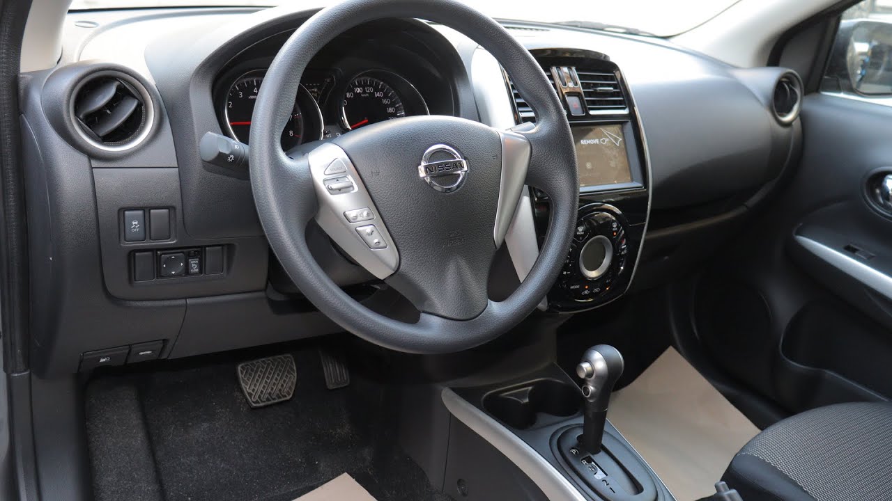 Обзор Nissan Sunny 2026 Super Saloon, бронзовый цвет кузова, черный салон.