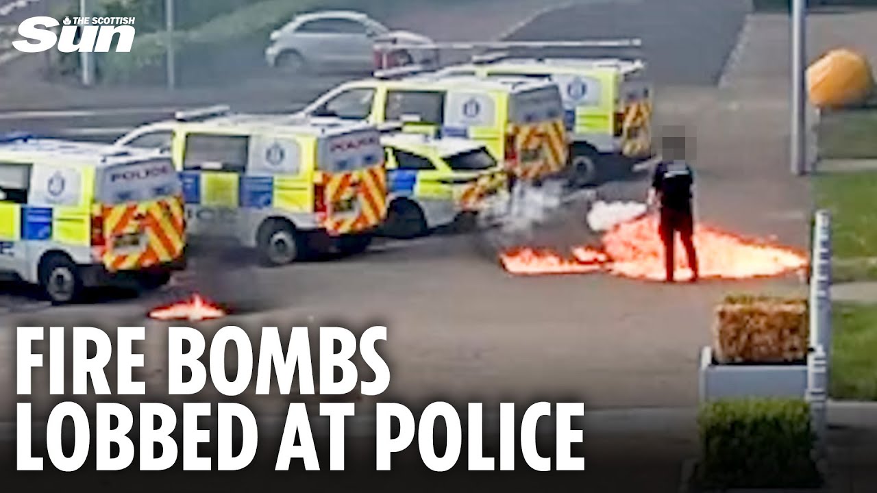 Shocking moment ex-soldier launches molotov cocktails at police officer & vans in broad daylight