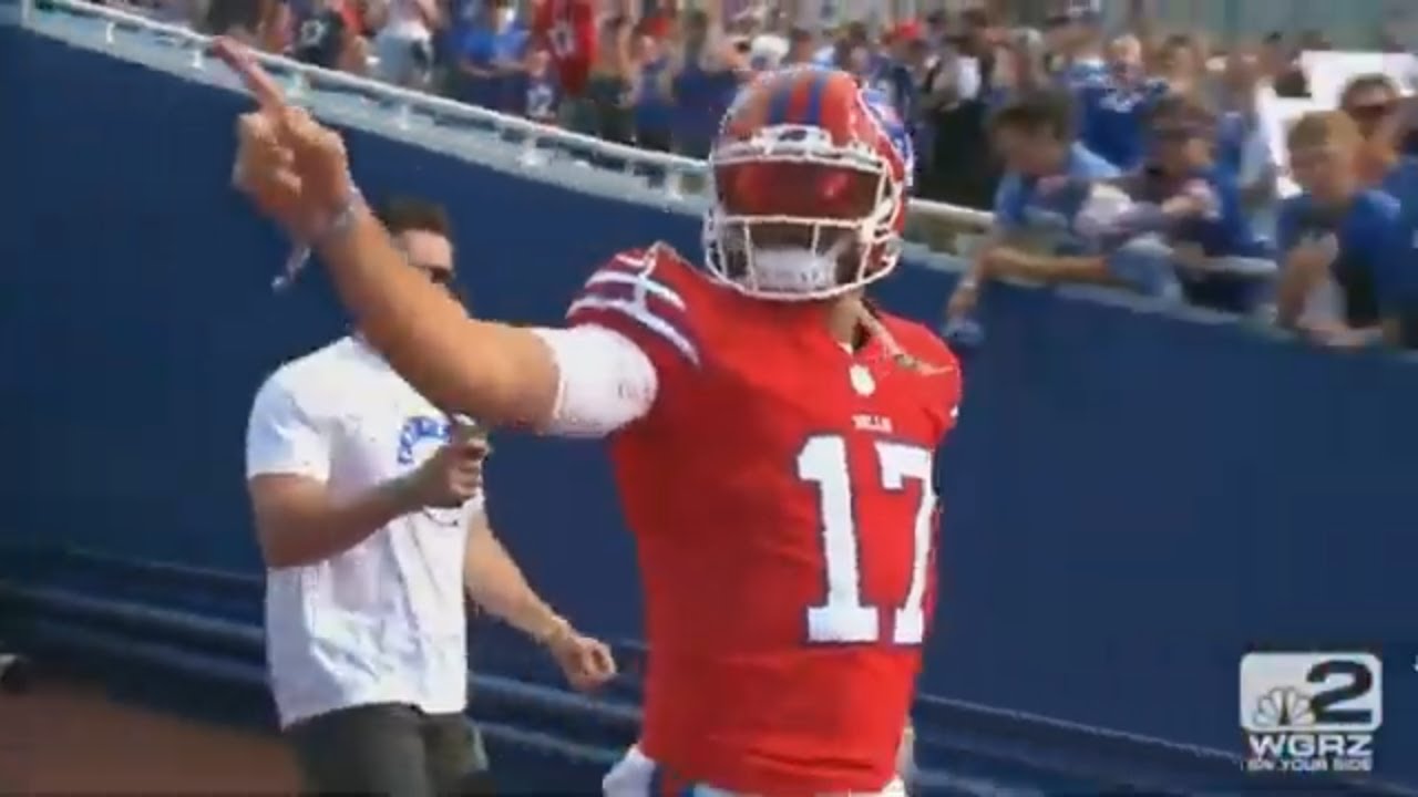 Josh Allen wears red Buffalo Bills helmet at Highmark Stadium practice