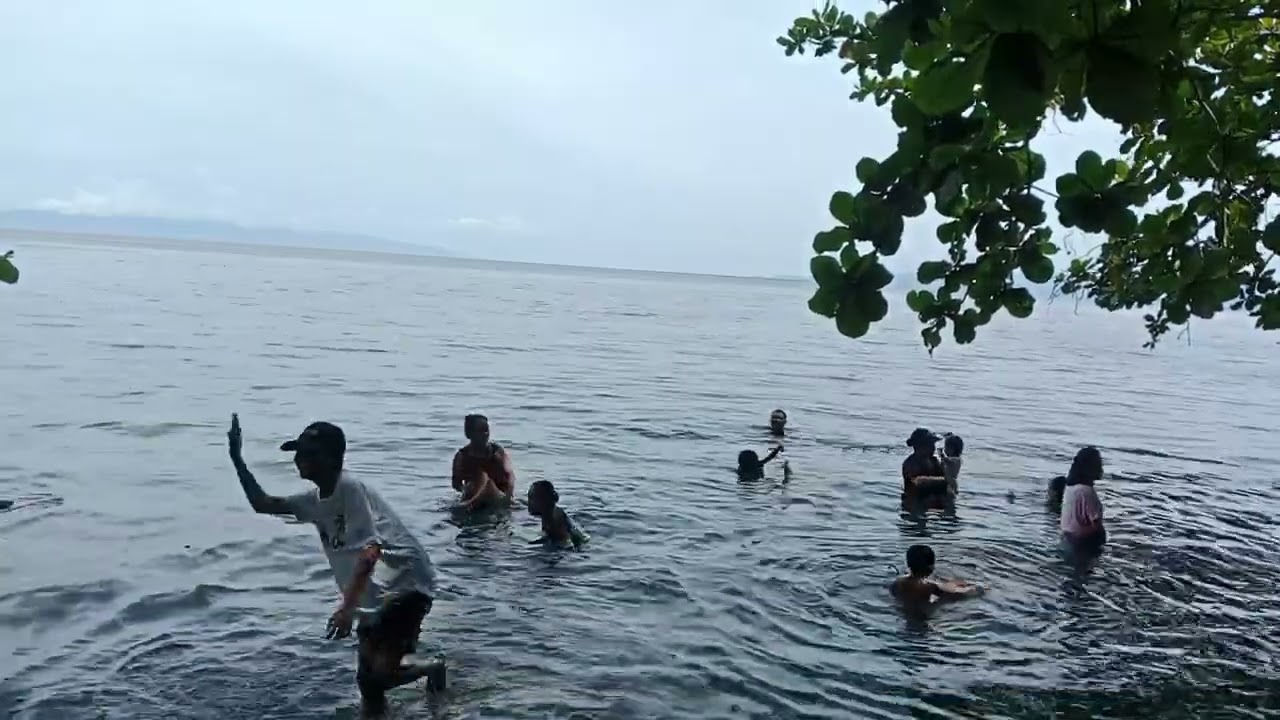 Panorama pantai desa Bori  gereja GBI behtani sayoang melakukan ibadah pantai di awal tahun 2026 