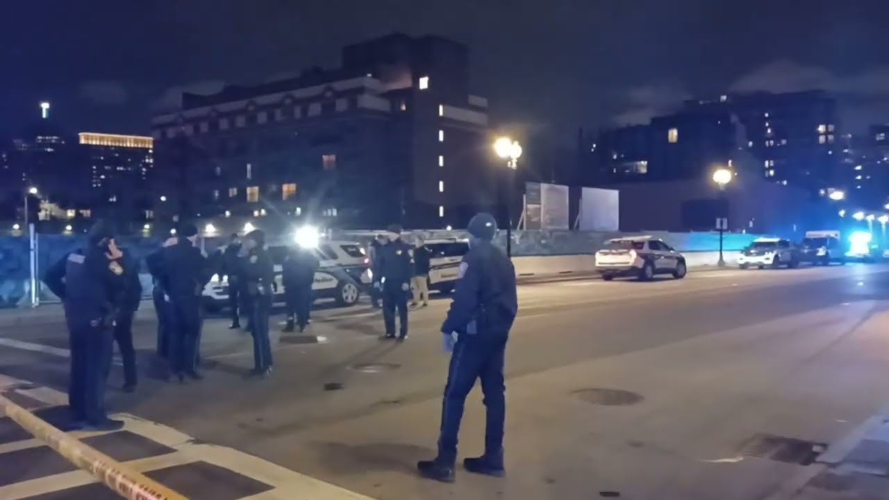 Boston police investigate a one person shot on Washington street at the bus stop. March 15, 2026