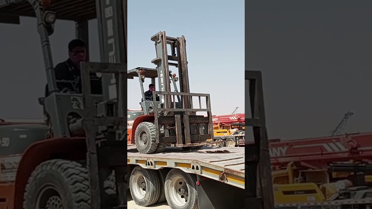 Loading Forklift in Reverse drive to Semi Lowbed Truck# Heli H2000 series