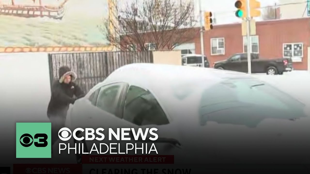 CBS News Philadelphia reporter helps push car stuck in South Philly snow