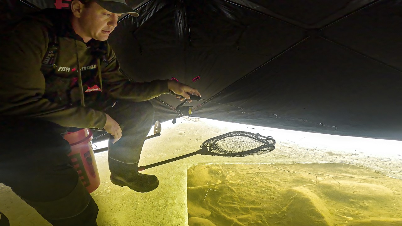 The Most Incredible Ice Fishing Strike (Topwater?!)
