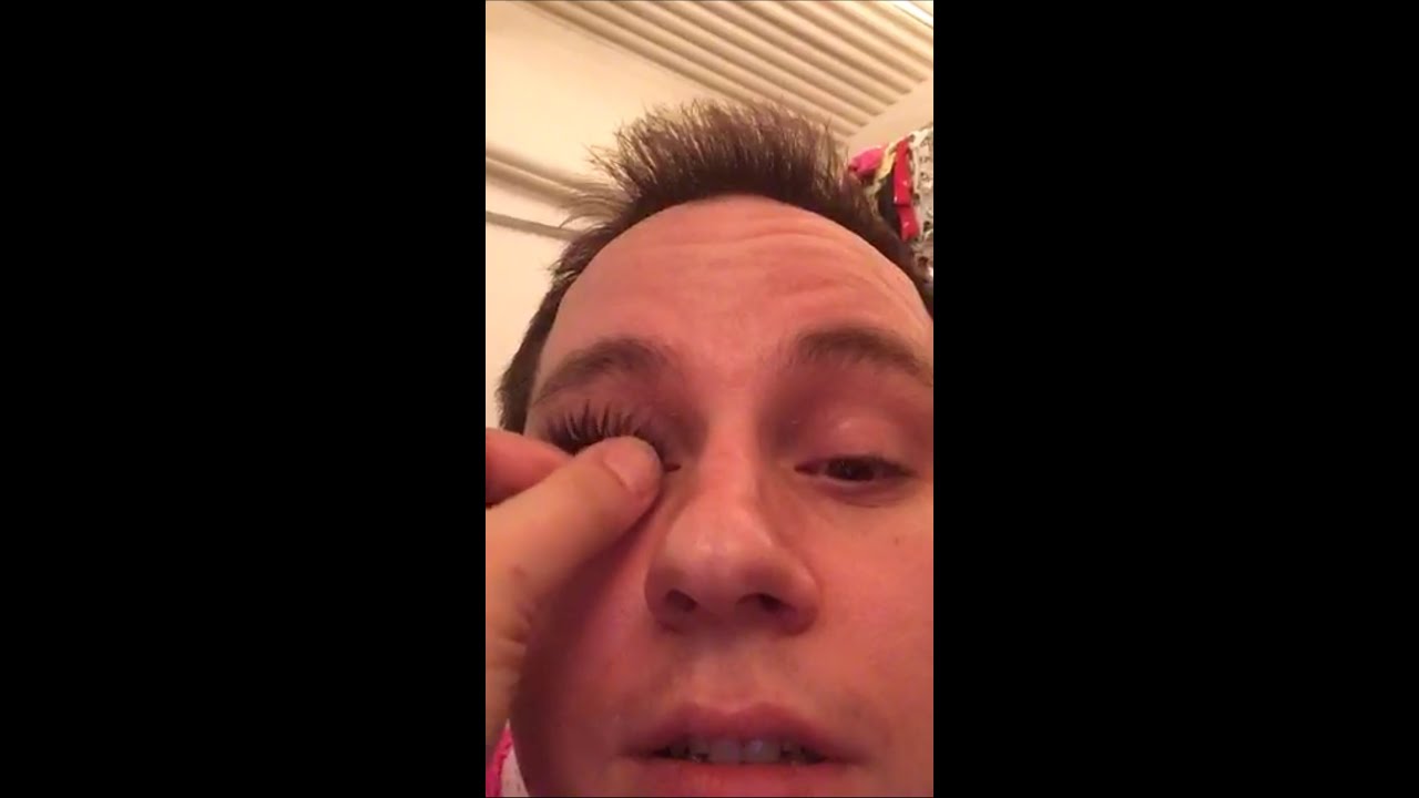 Trixie Mattel and Kim Chi pulling lashes off