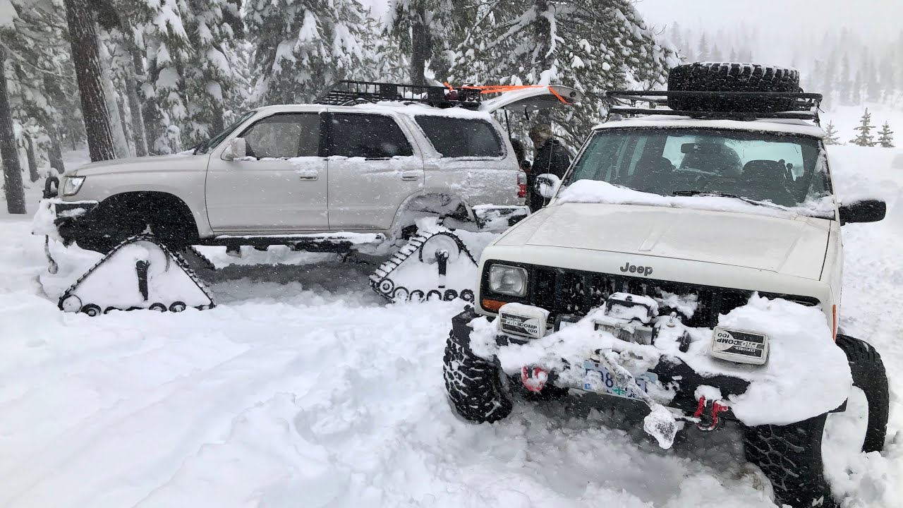 Snow wheeling in a blizzard on tracks. Snapped my U-joint!