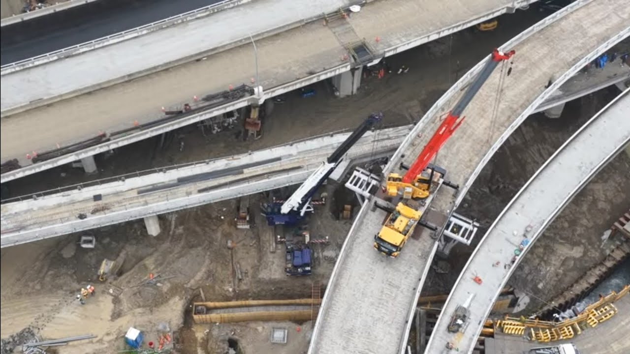 2026.03.06  淡江大橋工程 淡水端  輕軌鐵道 往漁人碼頭行人自行車金屬橋板吊裝橋面施工概況 各區最新進度概況 空拍直播
