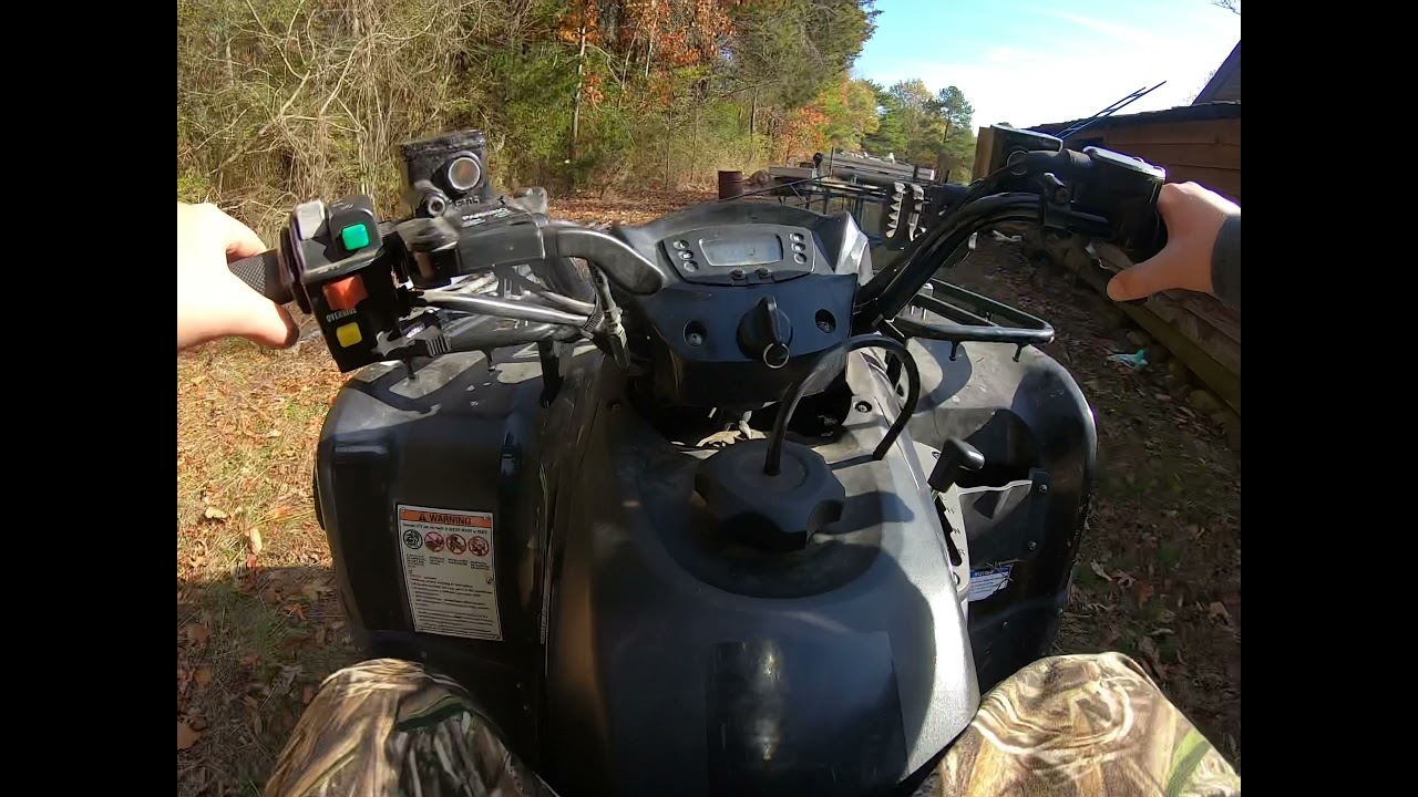 Kid wheelies Kawasaki 300 brute force