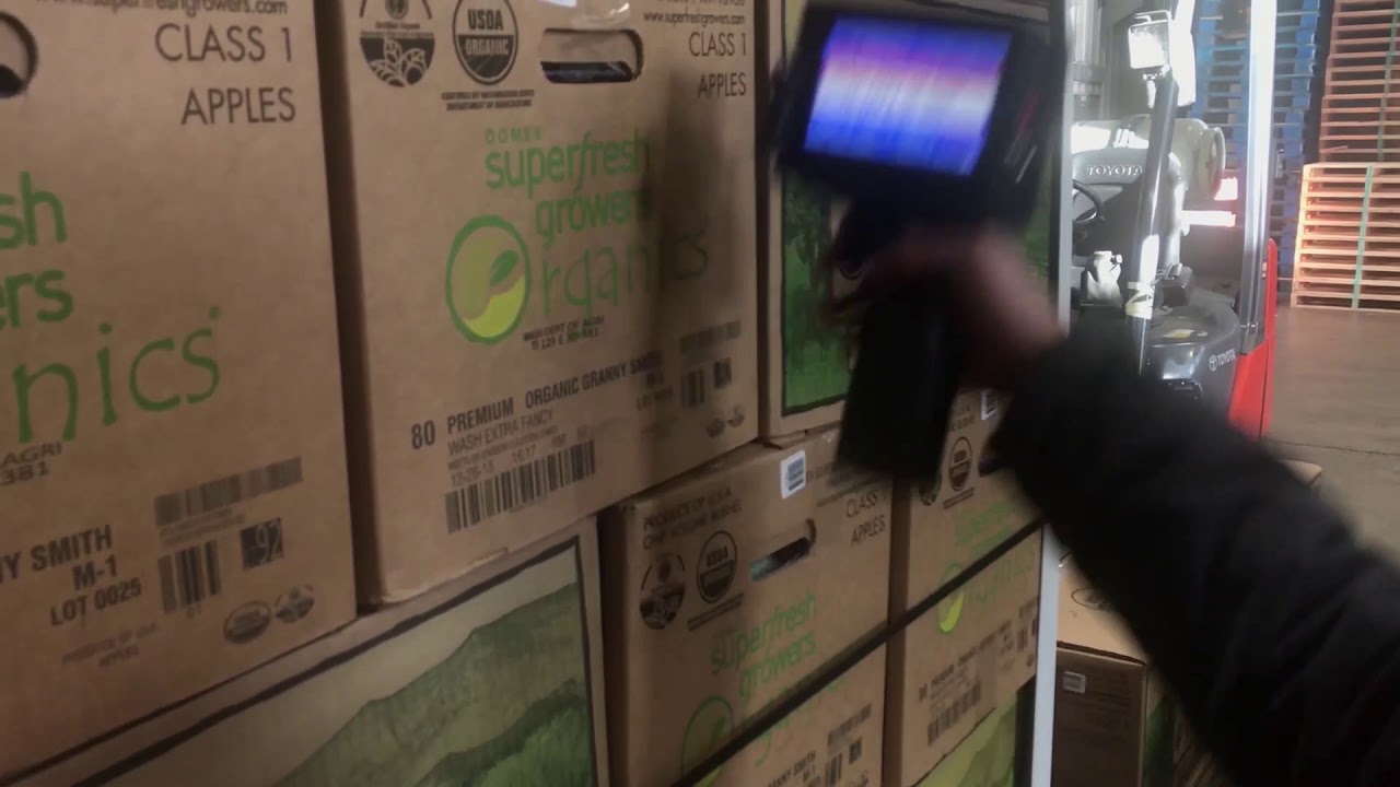Meenjet M3S Handheld Printer Coding Palletized Boxes in Warehouse - JS12 Black Ink